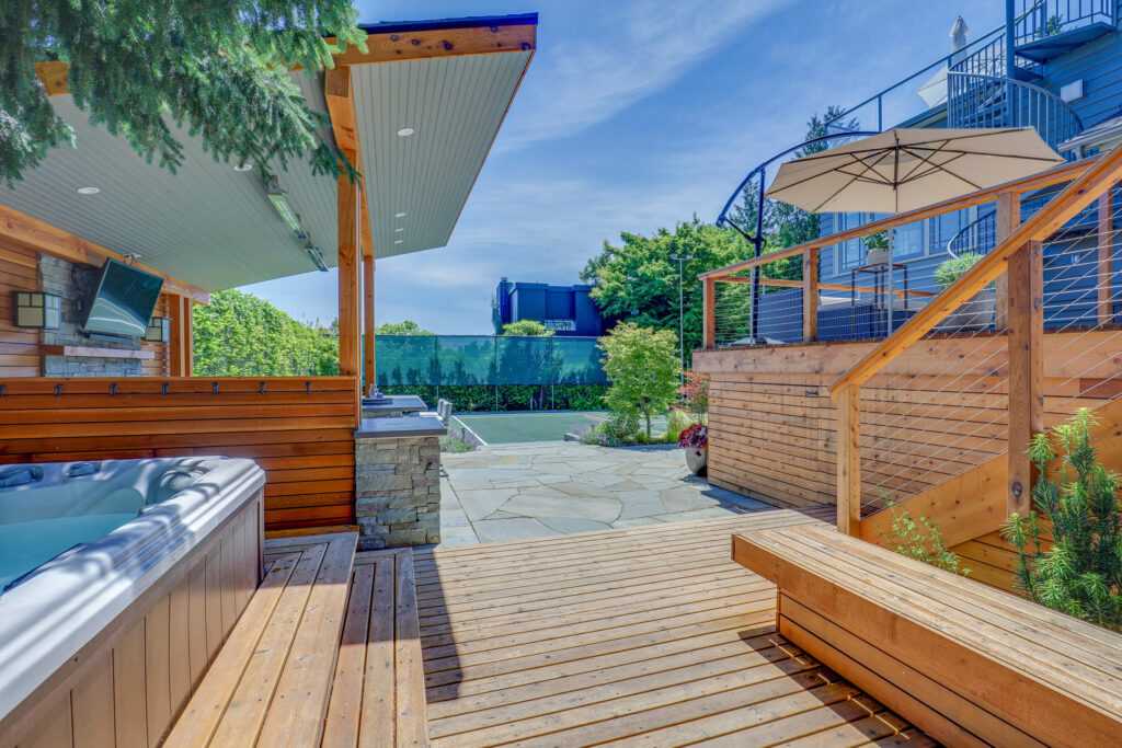 Luxurious outdoor living space with hot tub and decking