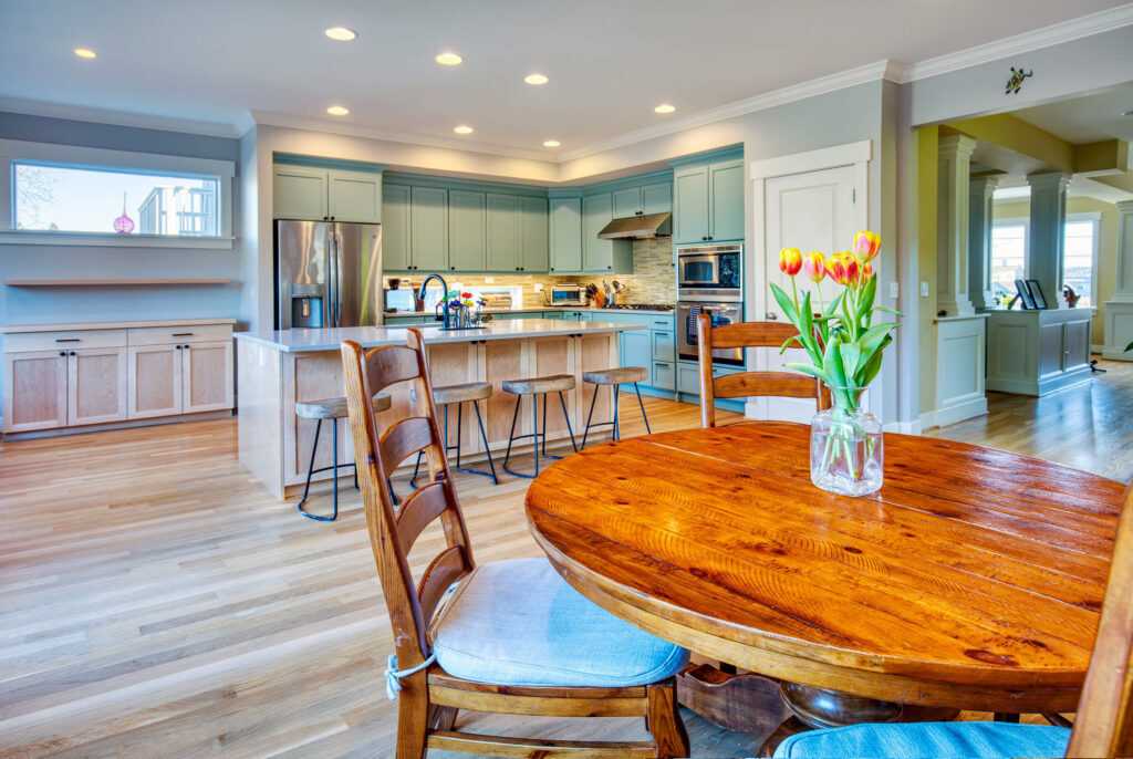 Spacious kitchen with modern appliances and wooden furniture