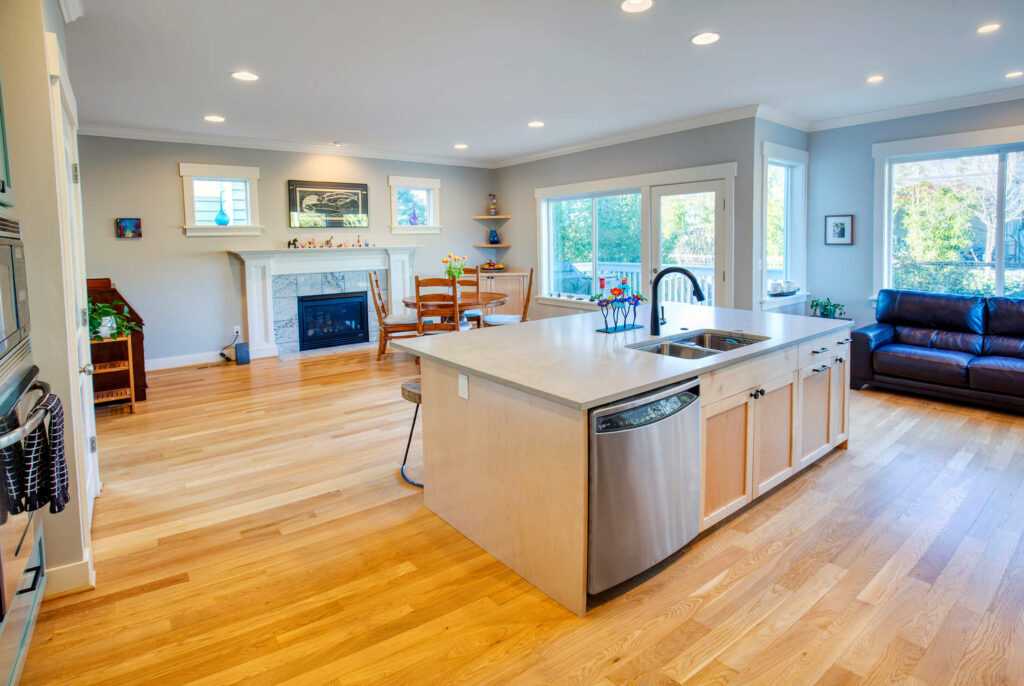 Spacious kitchen with island and hardwood floors