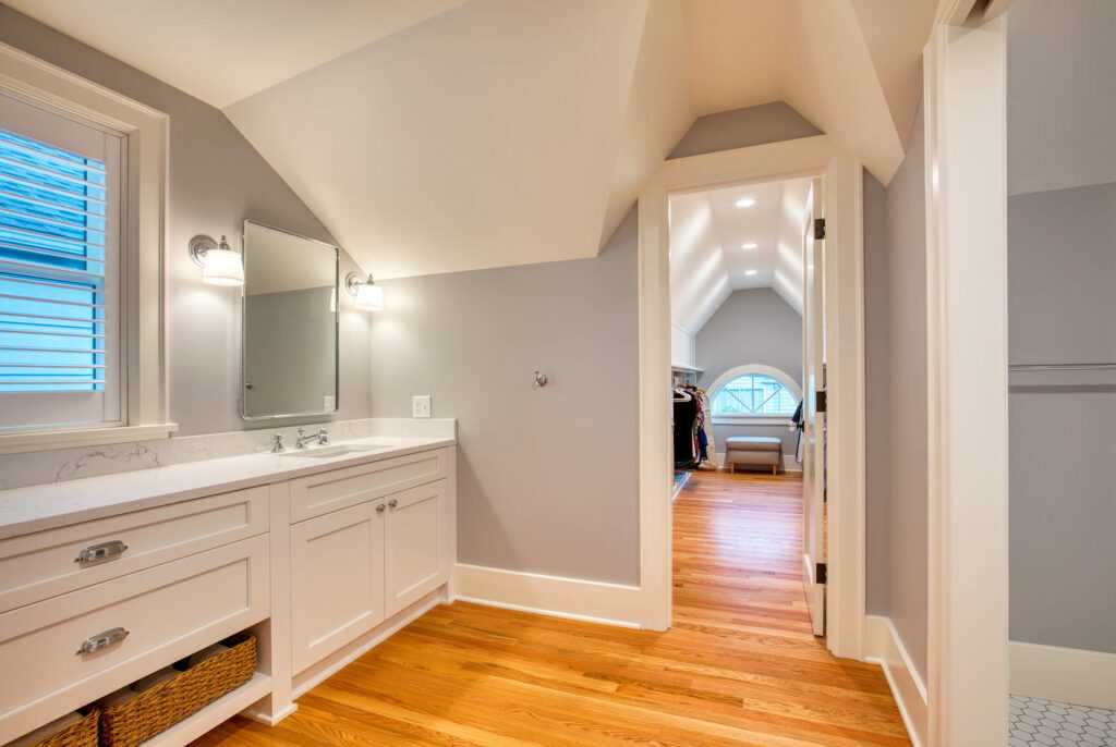Elegant bathroom leading to bright stylish bedroom