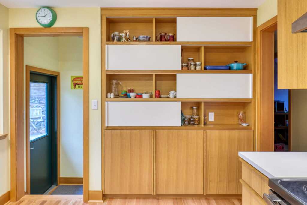 Modern kitchen with wooden cabinets and open shelving