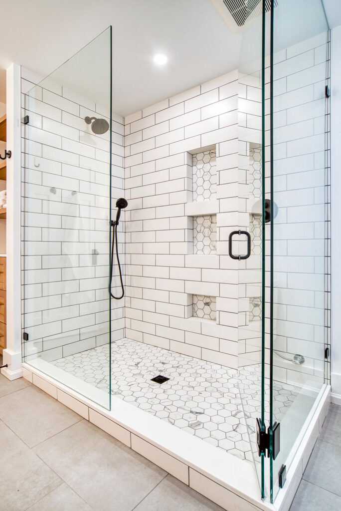 Modern bathroom with white subway tiled shower