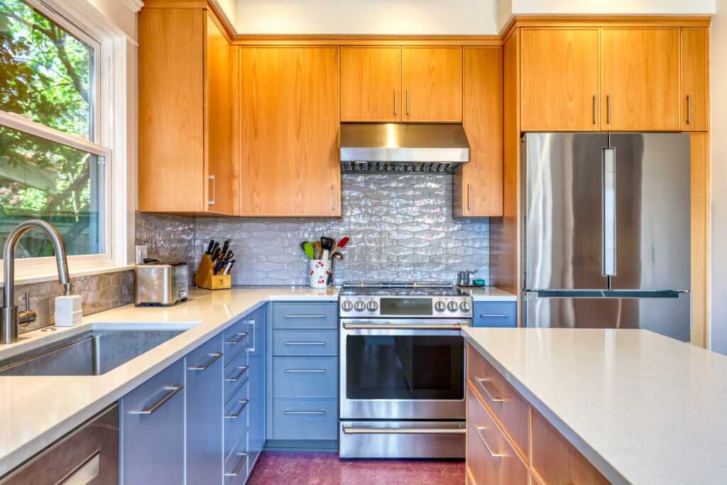 Modern kitchen with wooden cabinets and stainless steel appliances