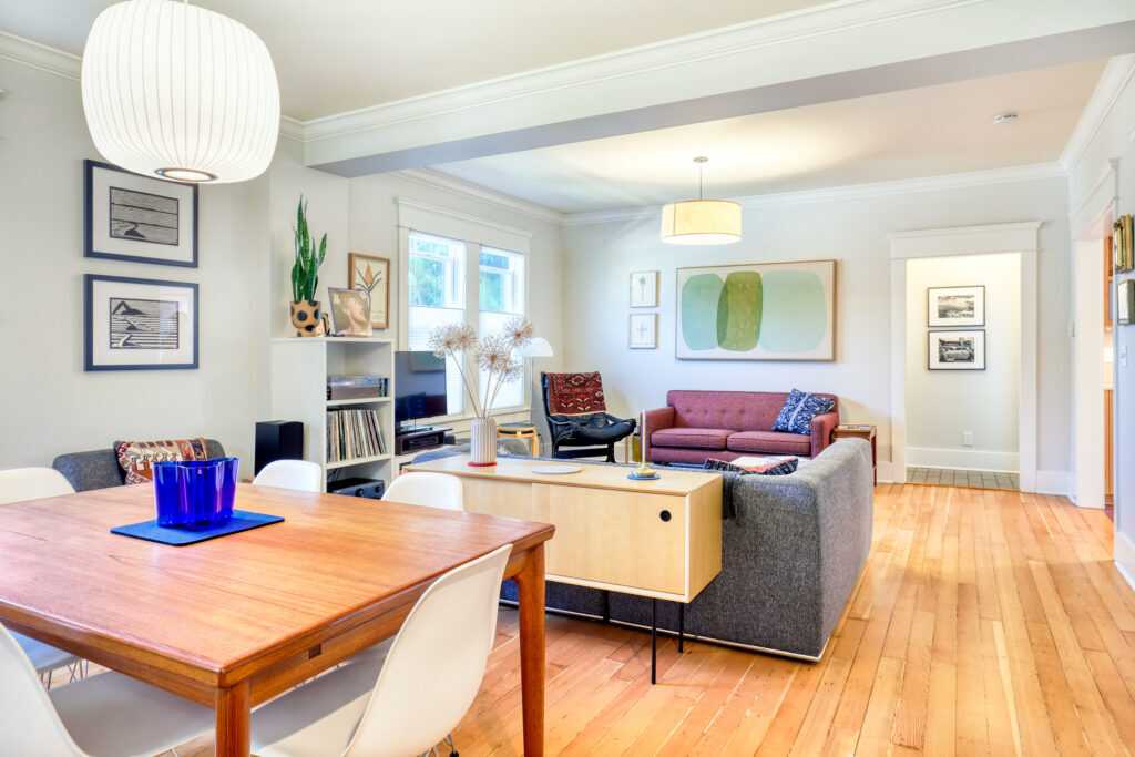 Modern living and dining room with wooden floor