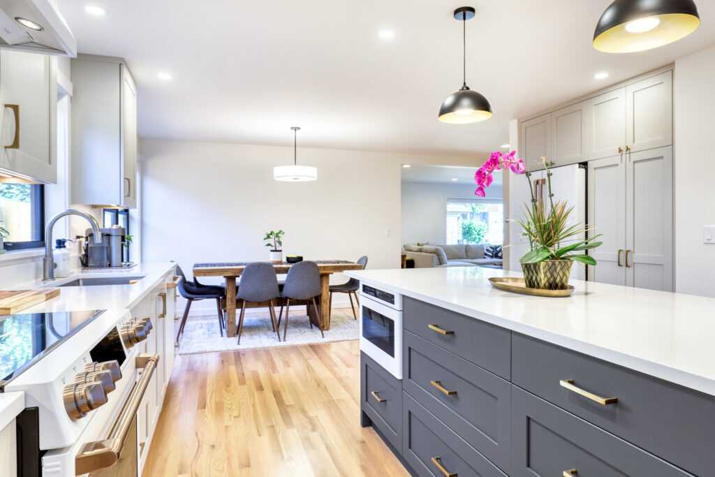 Modern kitchen interior with sleek design and lighting