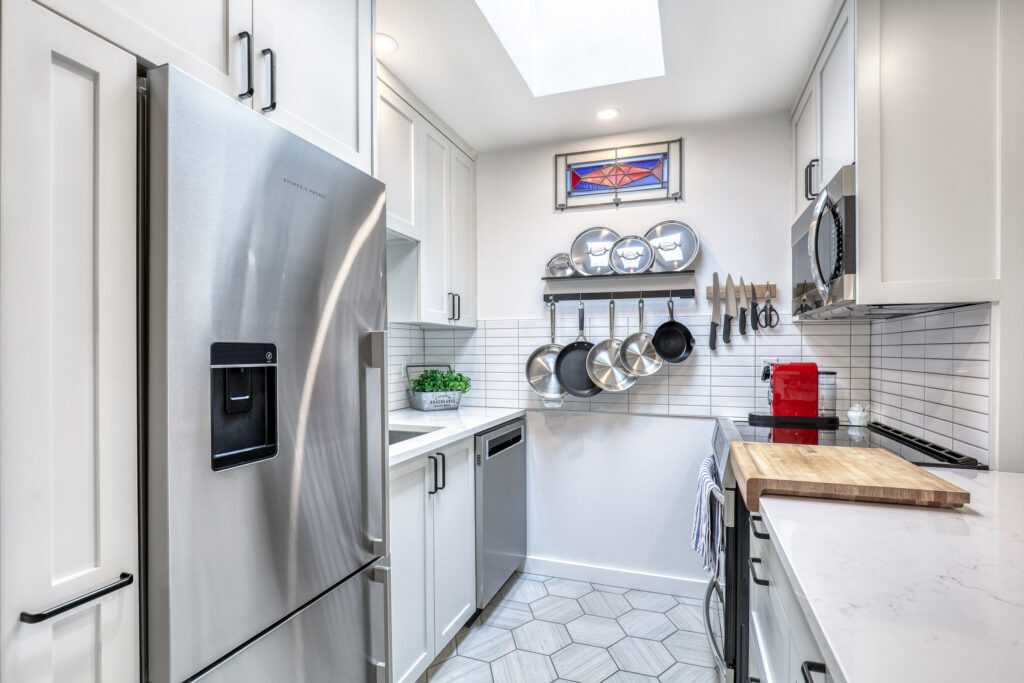 Queen Anne home remodel with open kitchen and dining design